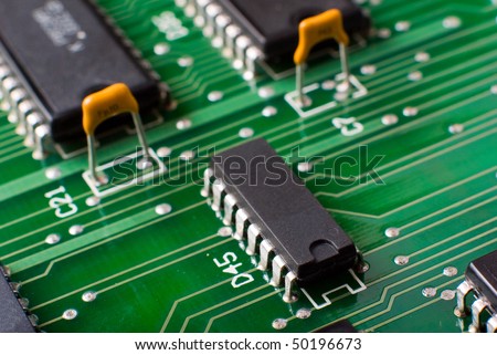 macro silicon chip on green board