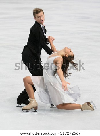 PARIS - NOVEMBER 17: Ekaterina RIAZANOVA / Ilia TKACHENKO of Russia perform free dance at the ISU Grand Prix Eric Bompard Trophy on November 17, 2012 at Palais-Omnisports de Bercy, Paris, France.