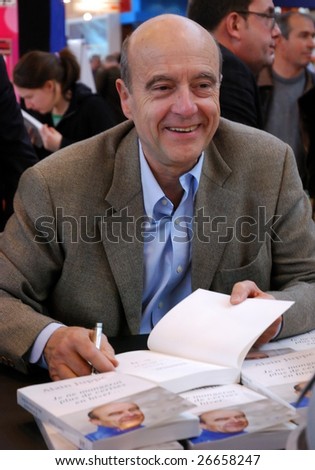 PARIS - MARCH 14: Former prime minister of France, major of Bordeaux and writer Alain Juppe at the International Book Fair - Salon du Livre 2009 on March 14, 2009 in Paris, France