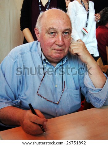 PARIS - MARCH 15: French photographer, journalist, filmmaker and co-founder of Gamma agency Raymond Depardon at the International Book Fair - Salon du Livre 2009 on March 15, 2009 in Paris, France