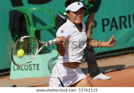 PARIS - MAY 21: Kurumi NARA of Japan plays the 3rd round qualification match at French Open, Roland Garros on May 21, 2010 in Paris, France.