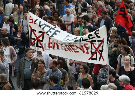 PARIS - SEPTEMBER 23: French teachers carry banner \