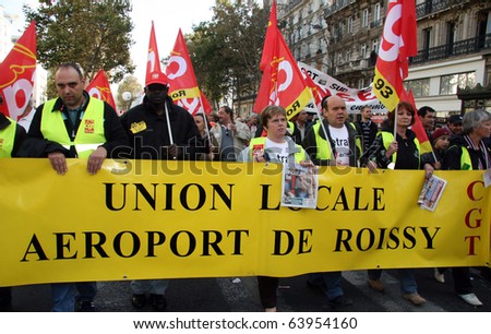 PARIS - OCTOBER 28: The CGT trade union of the Roissy Airport activists march during the strike against the retirement age reform on October 28, 2010 in Paris, France