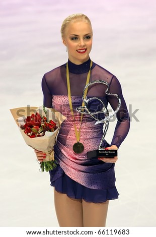 PARIS - NOVEMBER 27: Kiira KORPI of Finland poses at the medal ceremony after winning gold at Eric Bompard Trophy on November 27, 2010 at Palais-Omnisports de Bercy, Paris, France.