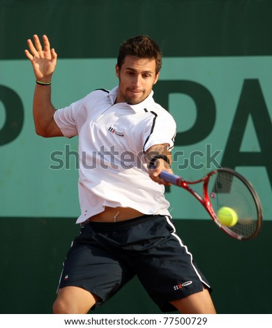 PARIS - MAY 18: Daniel Munoz de la Nava of Spain plays the 2nd round qualification match  at French Open, Roland Garros on May 18, 2011 in Paris, France.