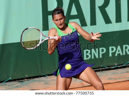 PARIS - MAY 18: Ekaterina Bychkova of Russia plays the 1st round qualification match at French Open, Roland Garros on May 18, 2011 in Paris, France.