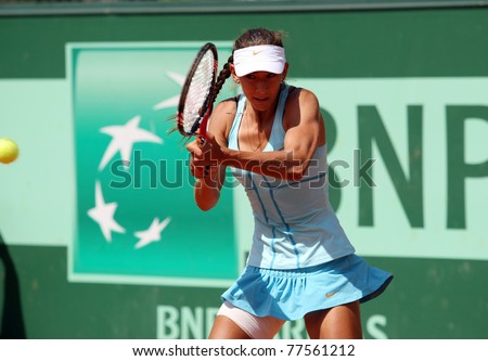 PARIS - MAY 19: Anastasia Pivovarova of Russia plays the 2nd round qualification match at French Open, Roland Garros on May 19, 2011 in Paris, France.
