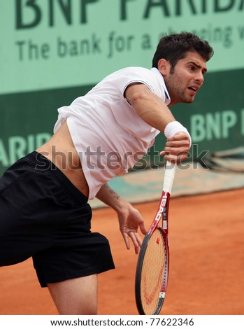 PARIS - MAY 20: Simone Bolelli of Italy plays the 3rd round qualification match  at French Open, Roland Garros on May 20, 2011 in Paris, France.