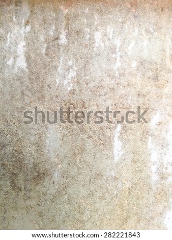 Wet and moist on the grunge cement wall texture background