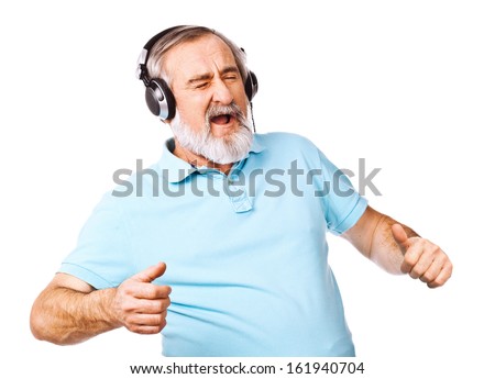 Old guy listening to music on his headphones