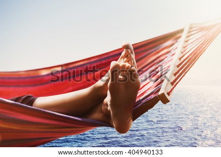Hammock above the sea, travel and active lifestyle concept