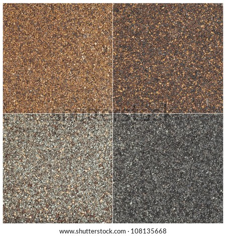 texture of four high impact asphalt roof shingles in different tones of brown and gray color