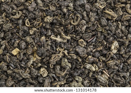 Chinese gunpowder (pearl) green tea - background texture of loose leaf