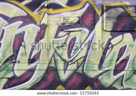 colorful graffiti on an old freight railroad car