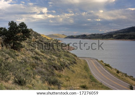 highway (Centennial Road) along Horsetooth Reservoir near Fort Collins, Colorado, after clearing storm