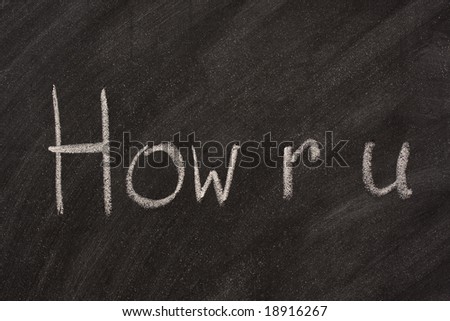 how are you in text message spelling handwritten with white chalk on blackboard