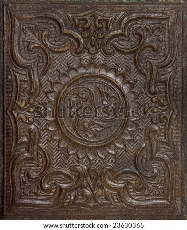 Antique  brown stamped gutta-percha background (natural latex) with floral patterns and some scratches - a cover of nineteenth  century  daguerreotype portrait case