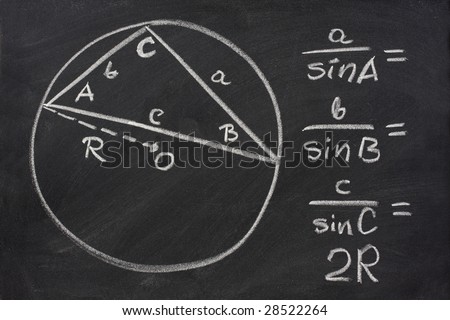 trigonometry identity - law of sines sketched with white chalk on blackboard, eraser smudges