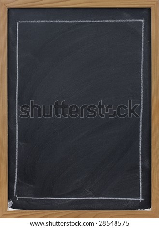blank blackboard in wooden frame, large rectangle sketched with white chalk, eraser smudge patterns