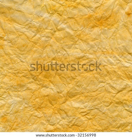 background of white printing paper painted with yellow watercolor paint and crumpled