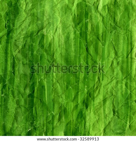 green watercolor background painted with vertical brush strokes on crumpled printing paper, rough texture