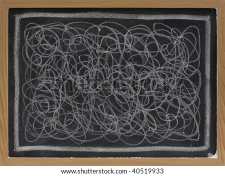 child art - white chalk chaotic scribble abstract on blackboard