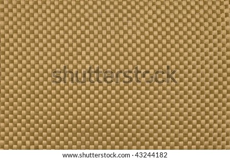 background of light and strong gold kevlar fiber cloth used in personal armor, racing boat and other sport equipment construction