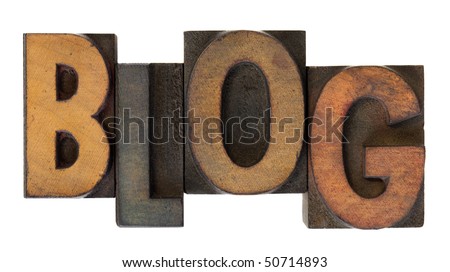word blog (web log)  in vintage wooden letterpress type, stained by ink, isolated on white
