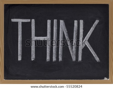 the word think - big letters in white chalk on blackboard