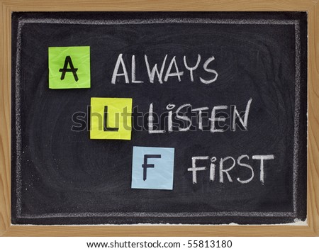 ALF acronym (always listen first) - good advice for training, counselling, customer service, selling or relationships, sticky notes and white chalk handwriting on blackboard