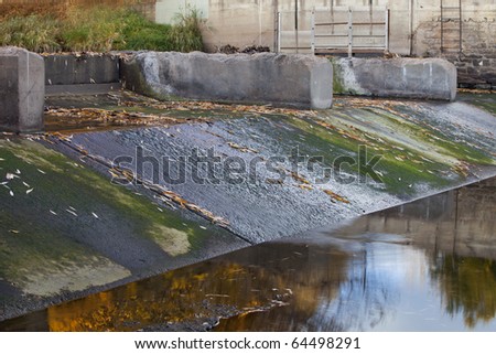 old diversion dam with irrigation ditch inlet - Cache la Poudre River in Fort Collins, Colorado, fall scenery with low water