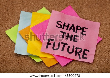 shape the future, motivational slogan, colorful sticky notes on cork bulletin board