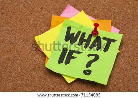 what if question - stack of color sticky notes on cork bulletin board
