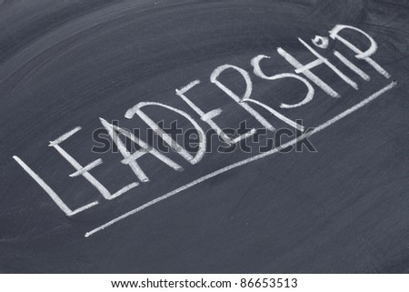 leadership word in white chalk handwriting on blackboard