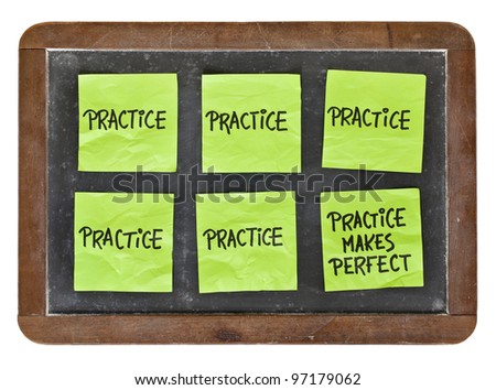 practice makes perfect concept - green sticky notes with black handwriting on a vintage slate blackboard