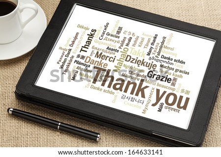 Thank You In Different Languages - Word Cloud On A Digital Tablet