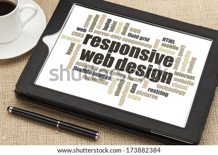 responsive web design word cloud  on a digital tablet with a cup of coffee