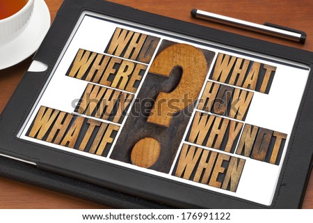 brainstorming or decision making concept - who, what, where, when, why, how, whatif and why not questions - a collage of words in vintage letterpress wood type on a digital tablet