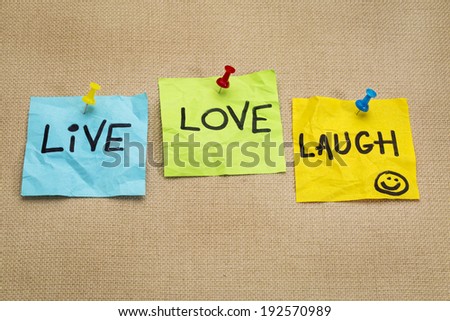 live, love, laugh - motivational words on sticky note reminders