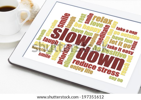 slow down and relax - reducing stress tips in a form of a word cloud on a digital tablet