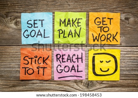 set goal, make plan, work, stick to it, reach goal - a success concept presented with colorful sticky notes