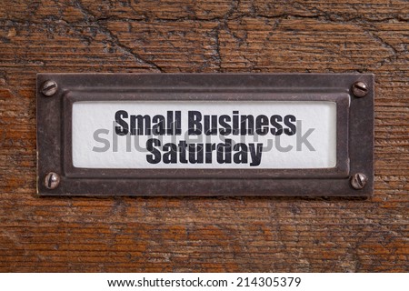 Small Business Saturday - file cabinet label, bronze holder against grunge and scratched wood