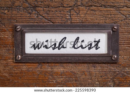 wish list - file cabinet label, bronze holder against grunge and scratched wood