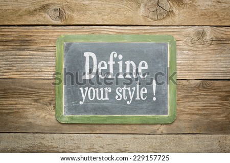 define your style advice on a  slate blackboard against rustic weathered wood planks