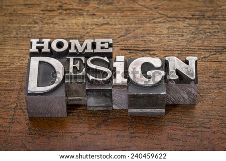 home design text  in mixed vintage metal type printing blocks over grunge wood