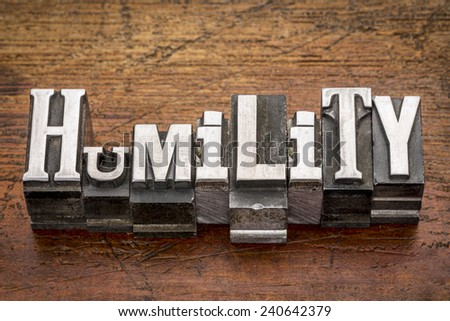 humility word in mixed vintage metal type printing blocks over grunge wood