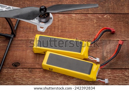 Two lithium-ion polymer rechargeable battery (LiPo, LIP, Li-poly) with balancing and main power plugs. LiPo batteries are used in portable electronics, drones and radio controlled models.