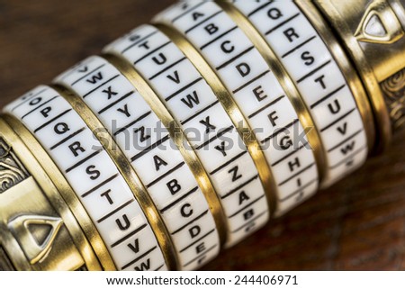 taxes word as a password to combination puzzle box with rings of letters