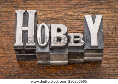 hobby word in mixed vintage metal type printing blocks over grunge wood