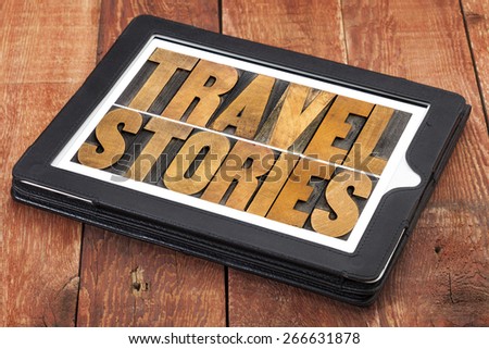 travel stories - word abstract in letterpress wood type on a digital tablet